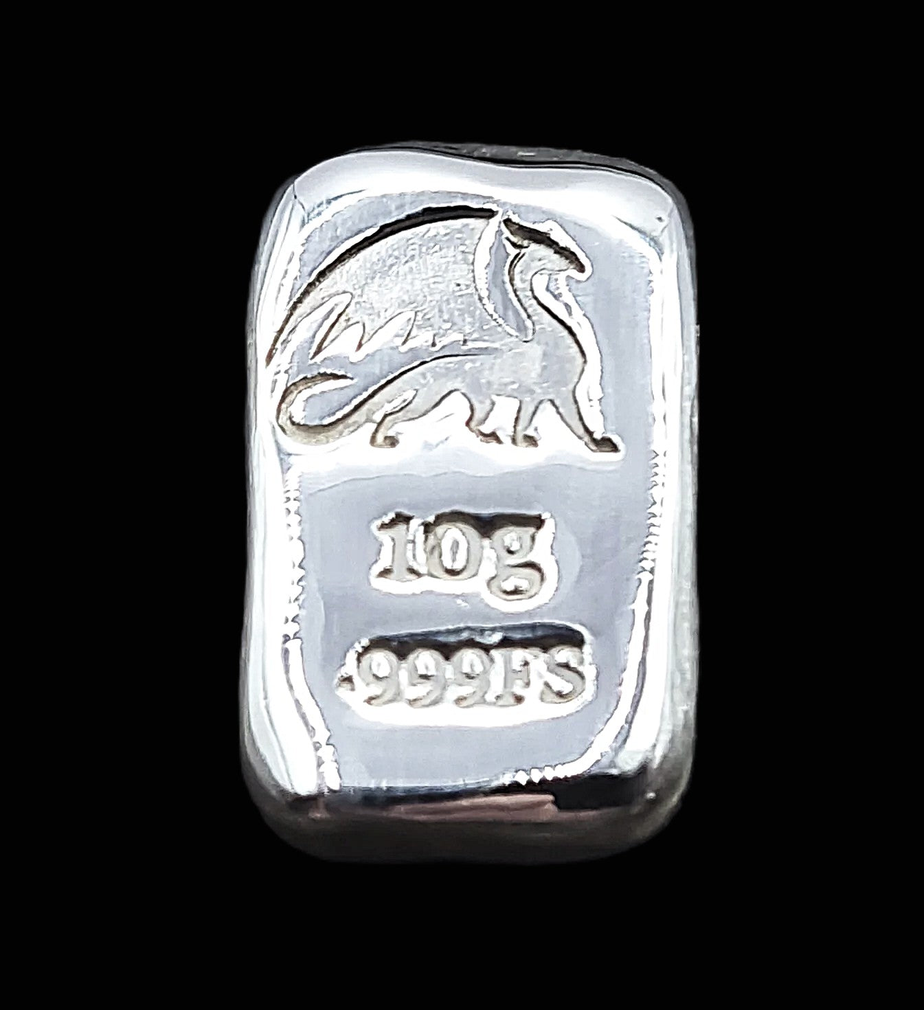 Close-up of a 10-gram 999 fine silver rectangular bar with a polished, reflective surface. The large Medieval Dragon stamp is stamped on the top half of the bar and 10g 999FS on the bottom half. The bar is positioned vertically.