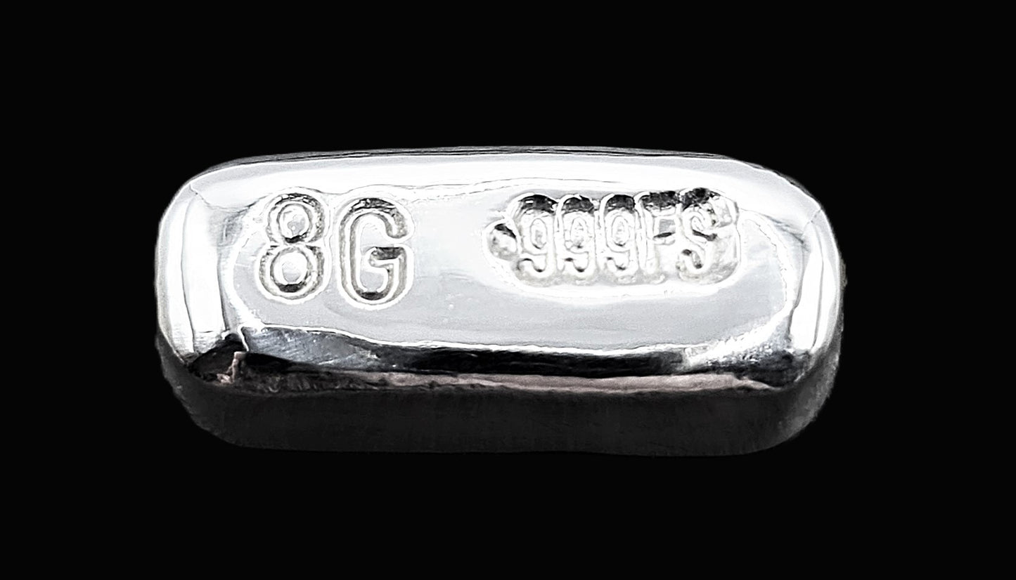 Close-up view of a 8g fine silver rectangular bullion bar, featuring stamps reading 8G and 999FS. This is a bar from our no frills generic range. The high-polish finish highlight its handcrafted quality. A premium collectible from the Tasmanian Bullion Company