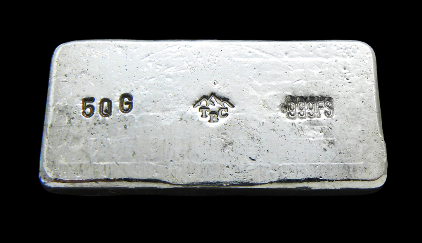 Close-up view of our 50g hand-poured fine silver bar stamp. The detailed stamps with weight and purity markings, as well as our TBC makers mark stamp highlights its handcrafted quality, making it a premium collectible from the Tasmanian Bullion Company.