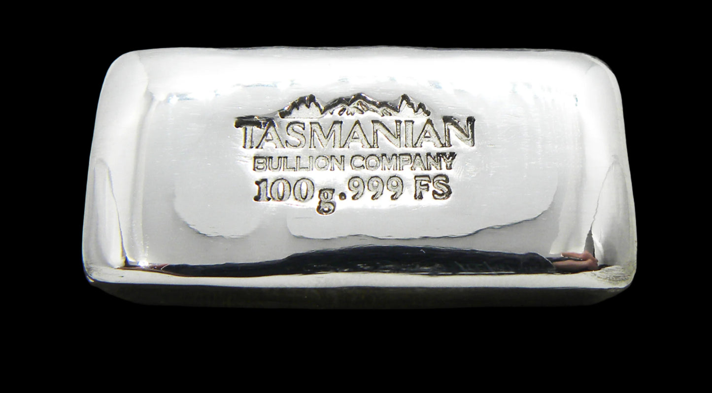 Our popular 100g hand-poured fine silver bar, uniquely crafted by a family-owned business in Tasmania. Each bar features a distinctive hand-stamped design with weight and purity markings, ensuring authenticity. The natural texture and unique imperfections from the pouring process give each bar a one-of-a-kind character. The fine silver surface reflects light, emphasizing its quality and investment appeal. Buy silver bullion today and add this premium 100g bar to your collection