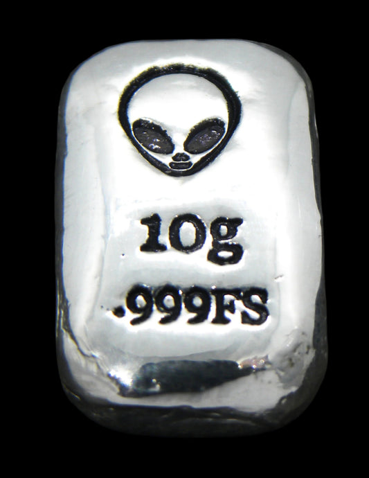 Close-up of a 10-gram 999 fine silver rectangular bar with a polished, reflective surface. The Alien head stamp is stamped on the top half of the bar and 10g 999FS on the bottom half. The bar is positioned vertically.