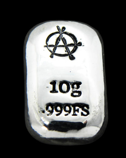 Close-up of a 10-gram 999 fine silver rectangular bar with a polished, reflective surface. The Anarchy symbol stamp is stamped on the top half of the bar and 10g 999FS on the bottom half. The bar is positioned vertically.