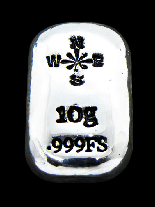 Close-up of a 10-gram 999 fine silver rectangular bar with a polished, reflective surface. The Compass stamp is stamped on the top half of the bar and 10g 999FS on the bottom half. The bar is positioned vertically.
