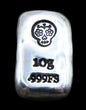 Close-up of a 10-gram 999 fine silver rectangular bar with a polished, reflective surface. The Sugar Skull stamp is stamped on the top half of the bar and 10g 999FS on the bottom half. The bar is positioned vertically.