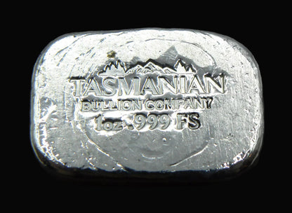 Close-up view of our 1oz hand-poured fine silver bar stamp. The detailed stamp with weight and purity markings highlights its handcrafted quality, making it a premium collectible from the Tasmanian Bullion Company.