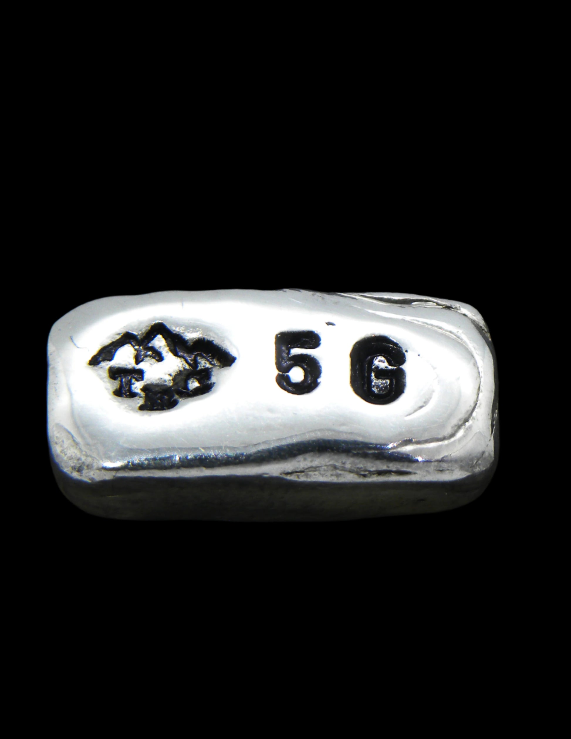 5g Hand-Poured Fine Silver Bar featuring a small mountain maker’s mark on the front and a .999FS purity stamp on the reverse. Finished with a black patina to highlight its unique hand-poured texture. Individually crafted in Tasmania, ensuring each piece is one of a kind. Overpoured to exceed the stamped weight and securely shipped with tracking